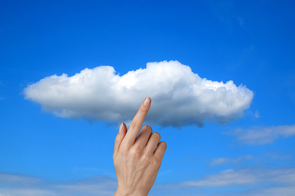 hand pointing to a cloud